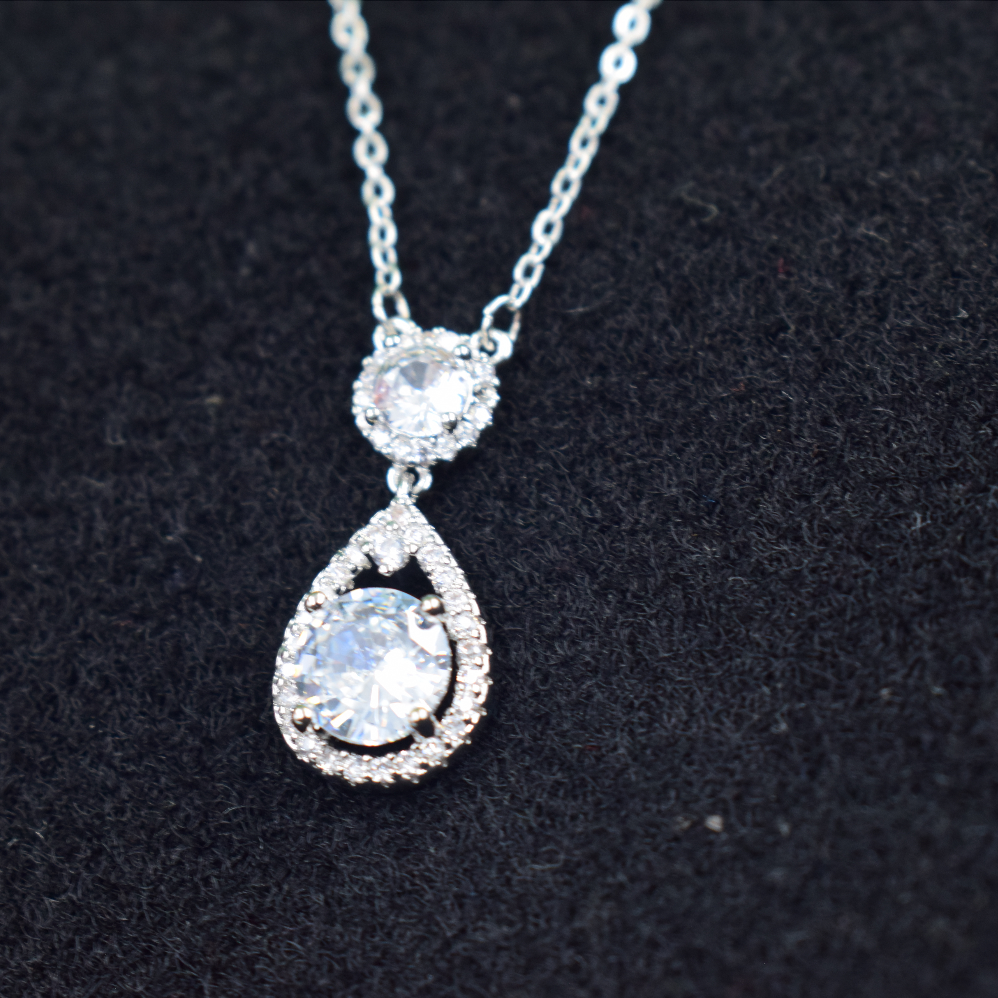 Radiant Teardrop Halo Pendant